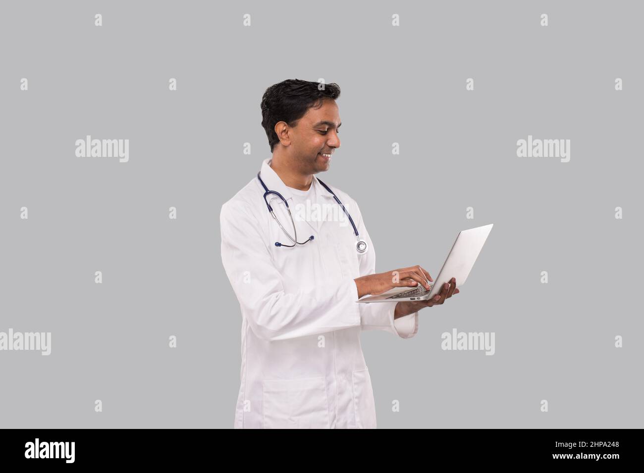 Male indian doctor hi-res stock photography and images - Alamy