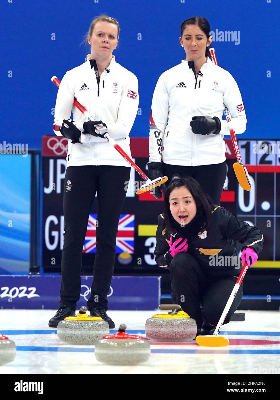 Great Britain's Vicky Wright and Eve Muirhead look as Japan team sweep