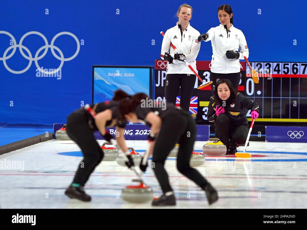 Great Britain's Vicky Wright and Eve Muirhead look as Japan team sweep