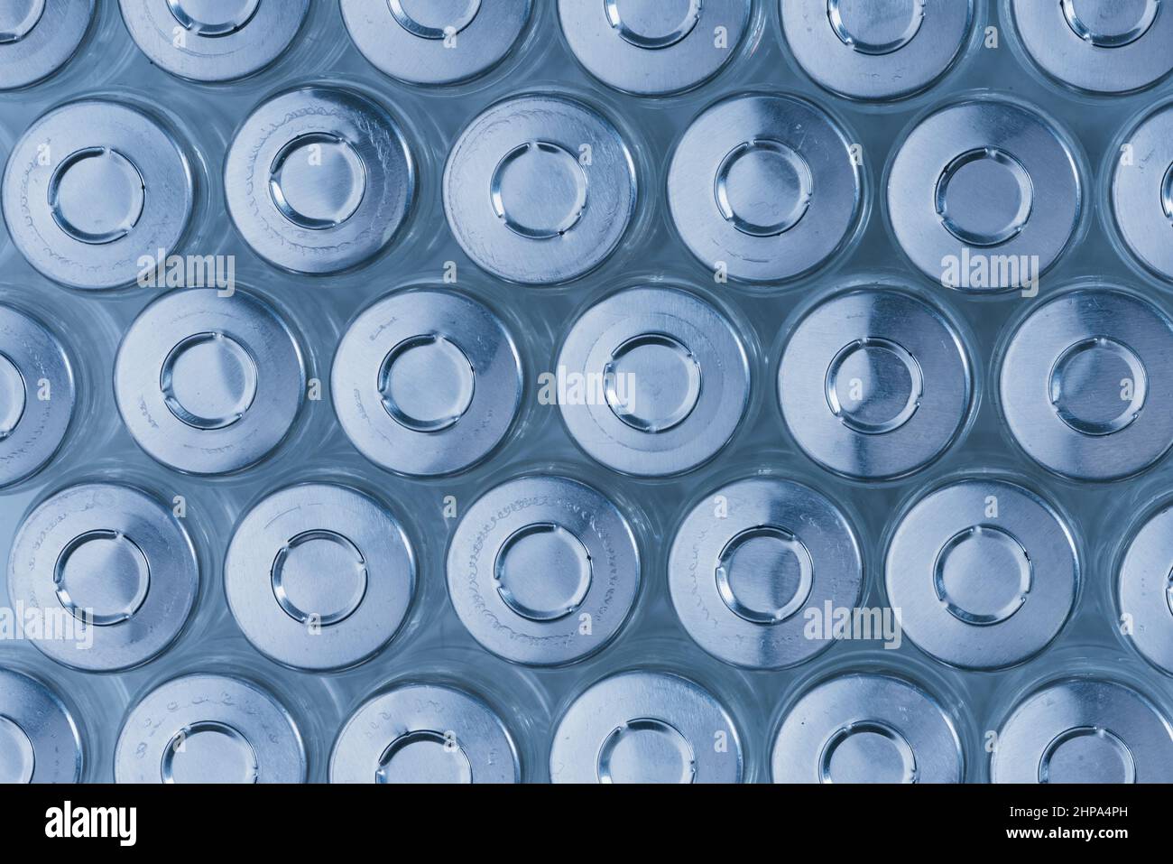 Glass medical ampoule vial for injection. Medicine is dry white drug