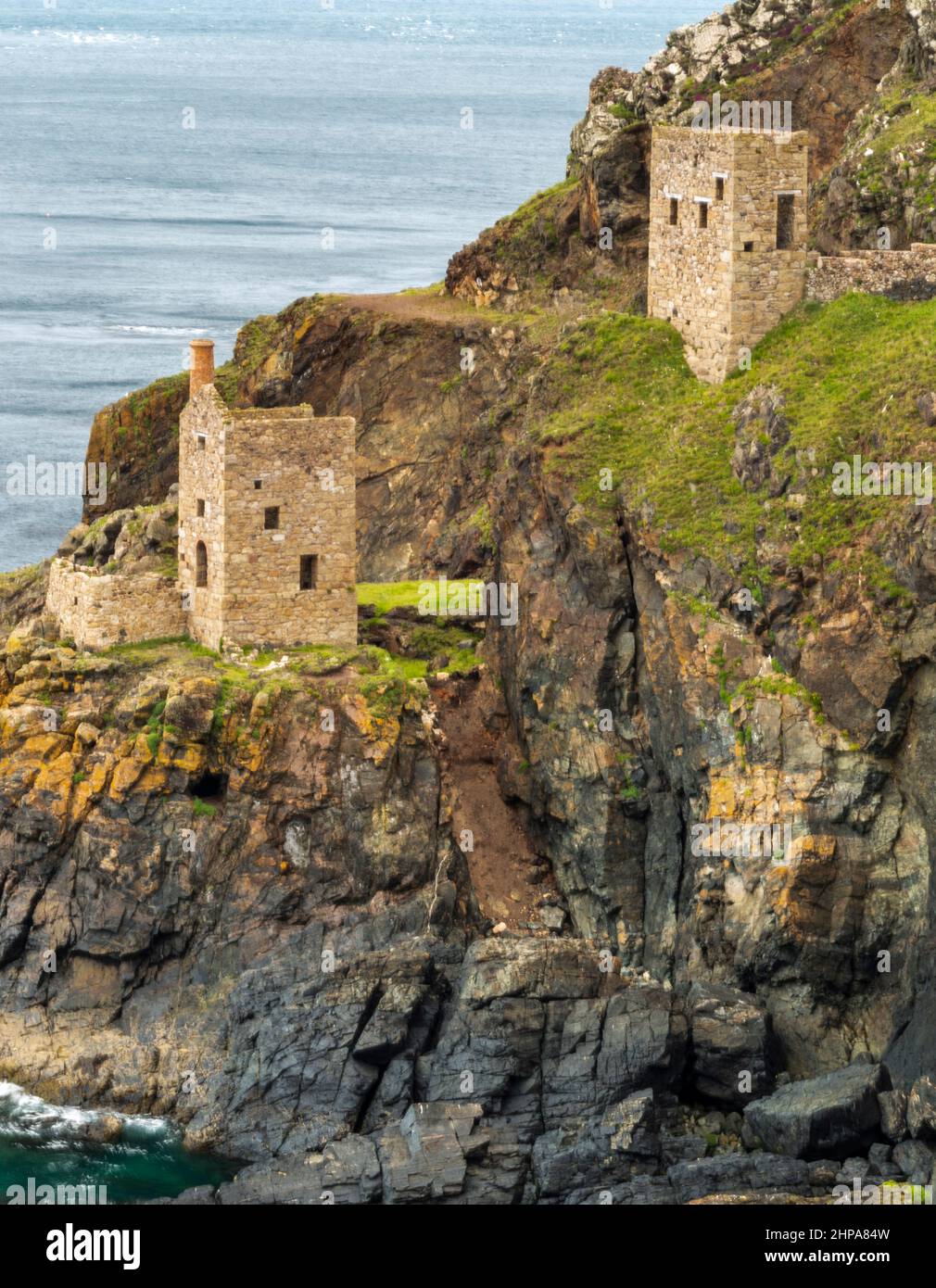 View from flower covered clifftop,UNESCO World Heritage site,on a calm summer day on the dramatic north Cornish coast,a popular National Trust holiday Stock Photo