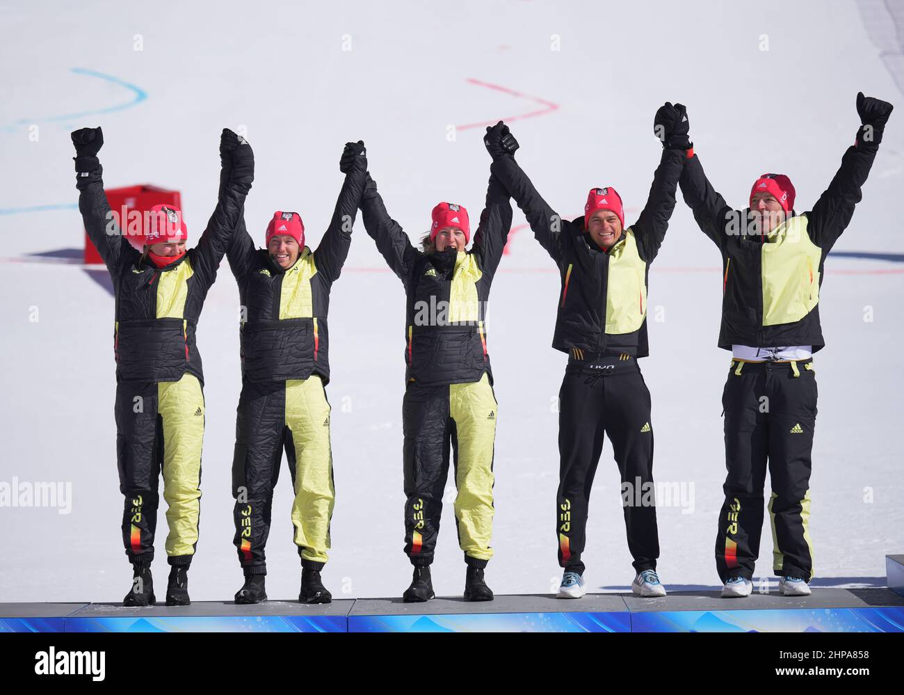 Yanqing, China. 20th Feb, 2022. Olympics, Alpine Skiing, Team, Mixed, Award Ceremony at the National Alpine Ski Center, runner-up Team Germany celebrates on the podium. Credit: Michael Kappeler/dpa/Alamy Live News Stock Photo