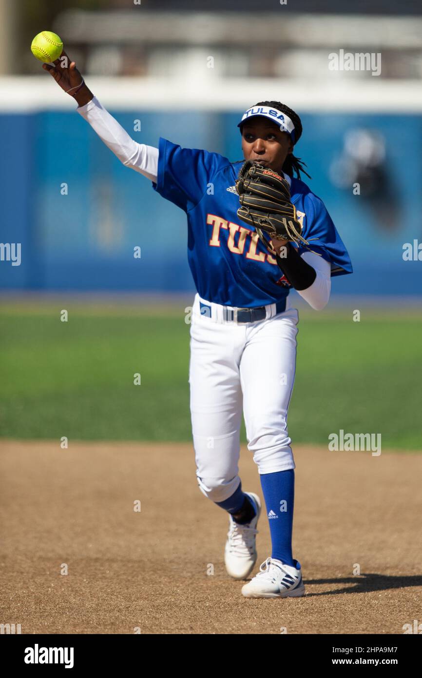 Tulsa Hurricanes infielder Imani Edwards (6) throws to first for an out against North Texas during the McNeese State Softball Tournament, Friday, Feb. Stock Photo