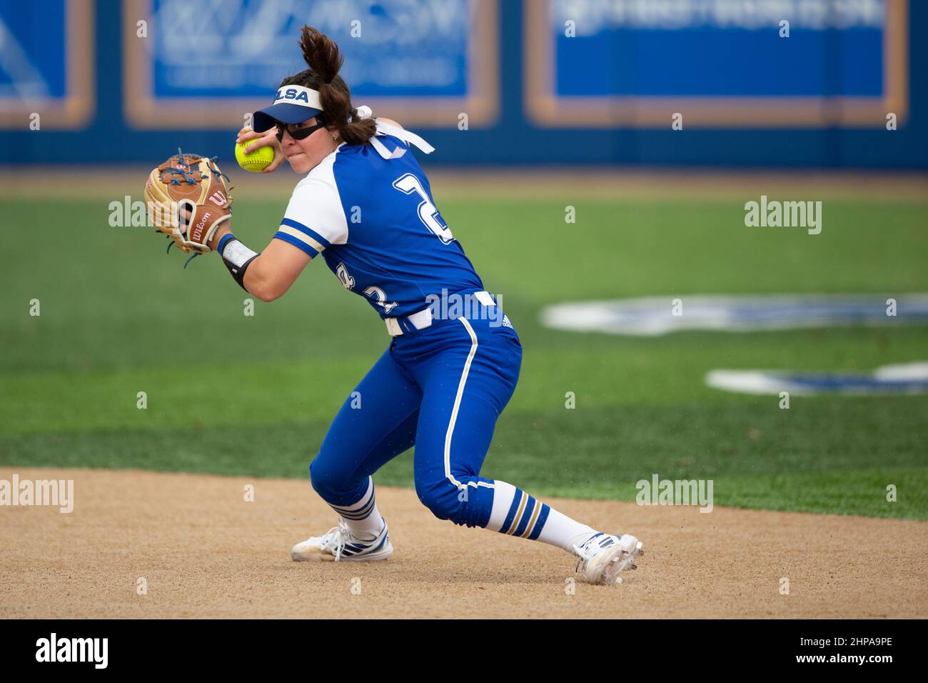 Tulsa Hurricanes infielder Abby Jones (2) fields a ball and throws to first for an out against UAB during the McNeese State Softball Tournament, Satur Stock Photo