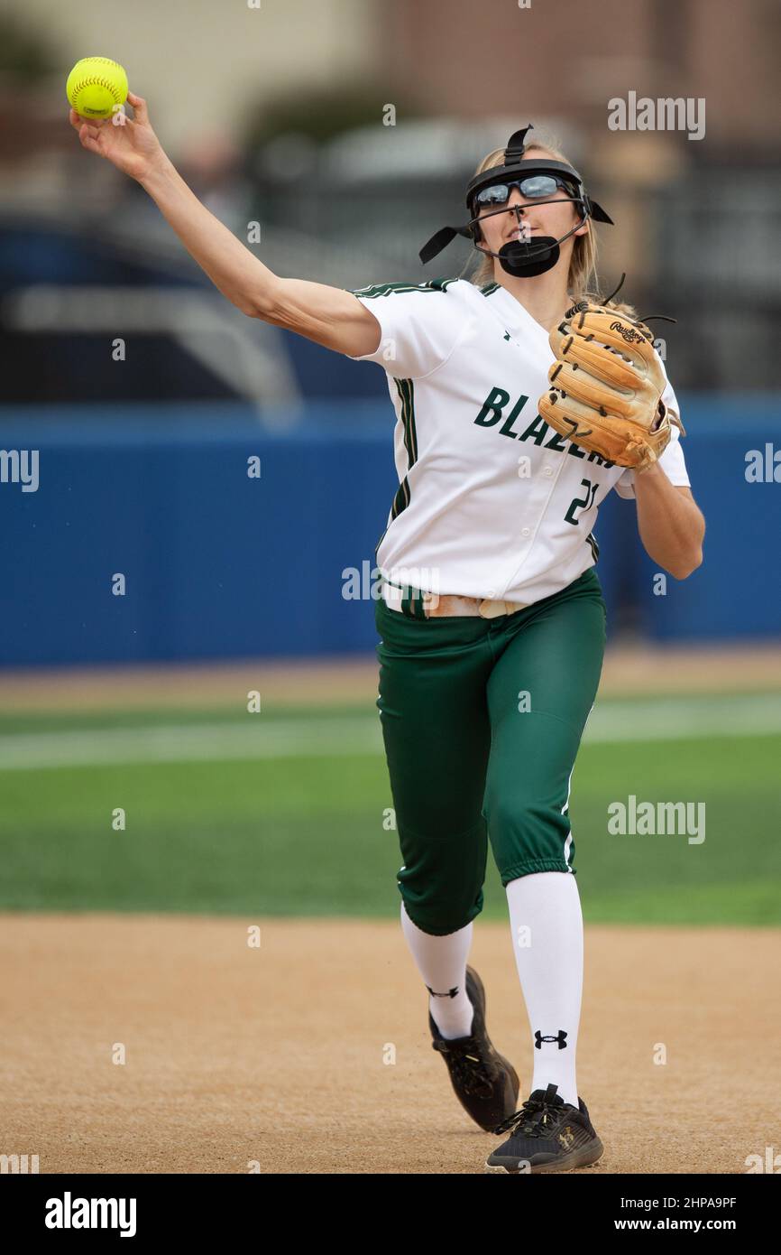 UAB Blazers infielder Olivia Valbak (21) throws to first for an out against Tulsa Hurricanes during the McNeese State Softball Tournament, Saturday, F Stock Photo