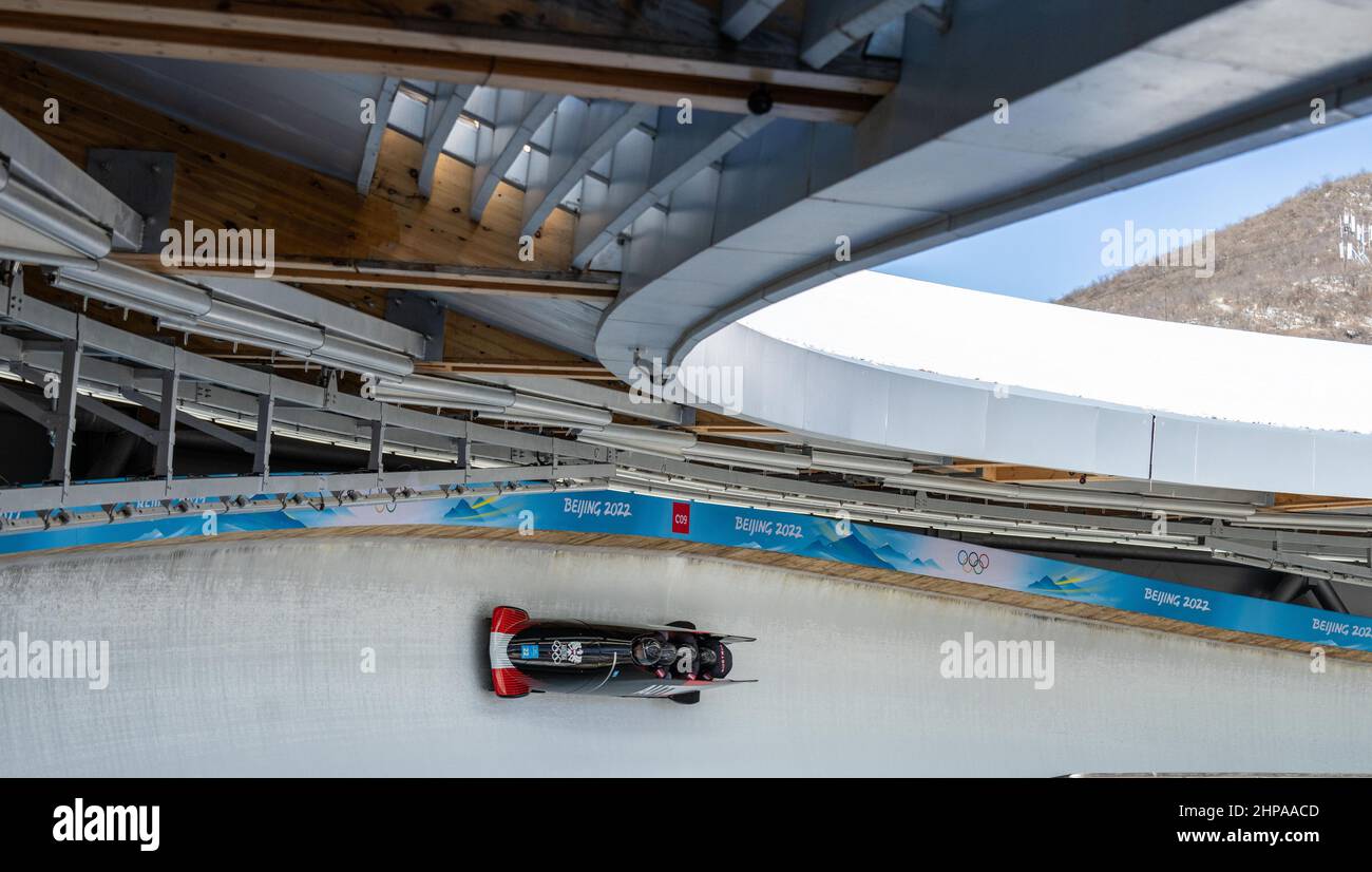 Beijing, China. 20th Feb, 2022. Markus Treichl/Markus Glueck/Sebastian Mitterer/Robert Eckschlager of Austria compete during the bobsleigh 4-man heat of Beijing 2022 Winter Olympics at National Sliding Centre in Yanqing District, Beijing, capital of China, Feb. 20, 2022. Credit: Jiang Wenyao/Xinhua/Alamy Live News Stock Photo
