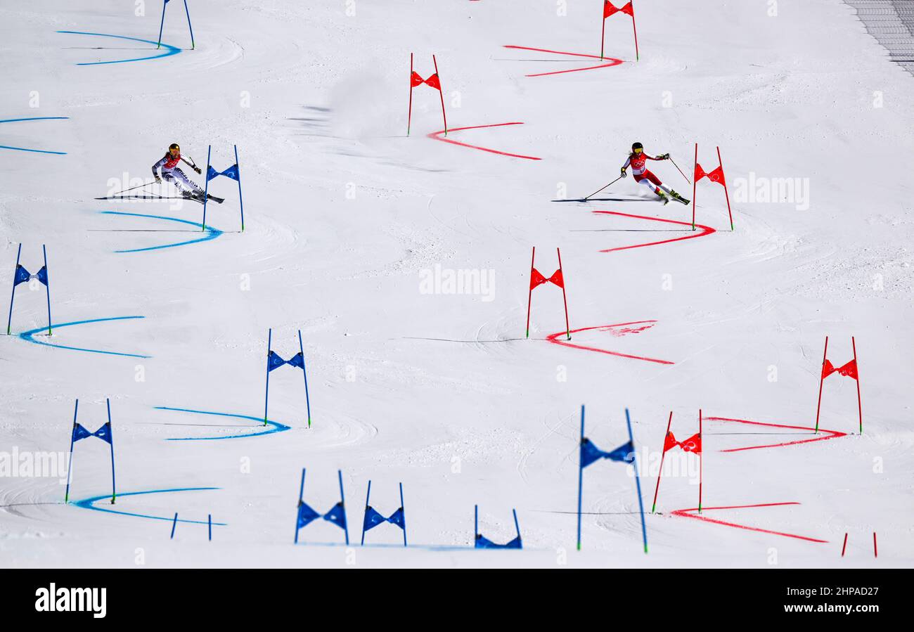 Beijing, China. 20th Feb, 2022. Katharina Truppe (R) of Austria and Lena Duerr of Germany compete during the alpine skiing mixed team parallel final of Beijing 2022 Winter Olympics at National Alpine Skiing Centre in Yanqing District, Beijing, capital of China, Feb. 20, 2022. Credit: Lian Zhen/Xinhua/Alamy Live News Stock Photo