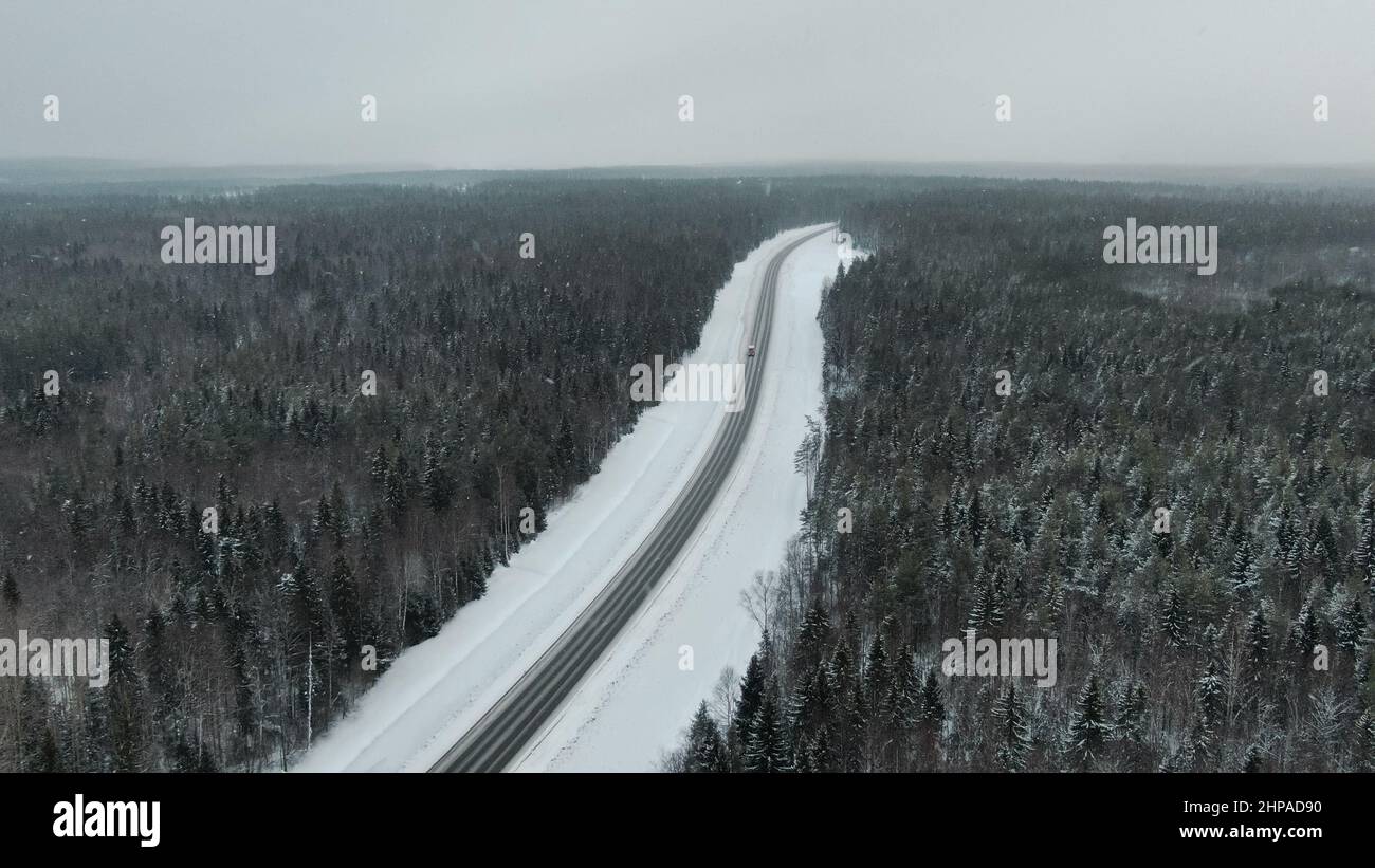Top view of the road in the winter forest Stock Photo - Alamy