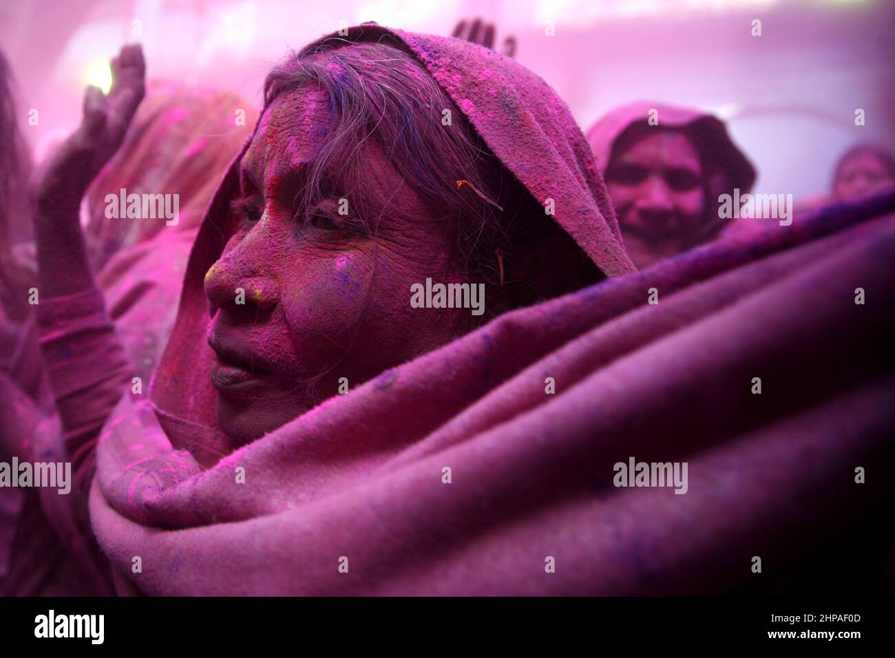 Indian widow women celebrate Holi festival in a old age home for widow women in Vrindavan, India in 2015. Stock Photo