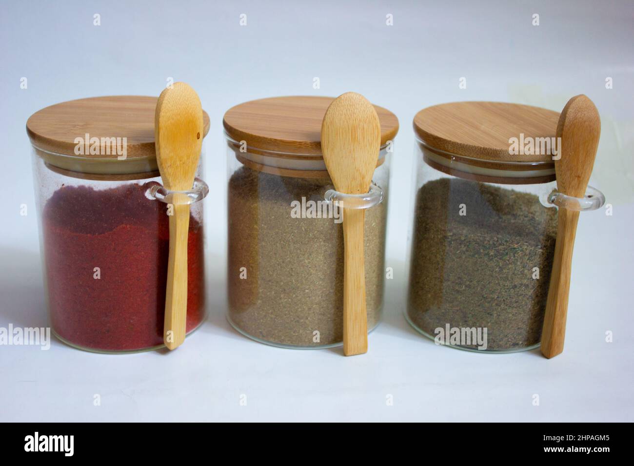 https://c8.alamy.com/comp/2HPAGM5/jars-for-storing-spices-on-a-white-background-2HPAGM5.jpg