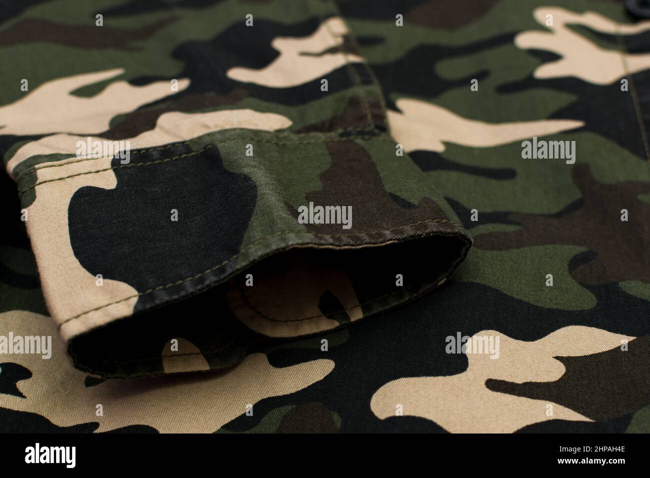 Military camouflage uniform, sleeve close up Stock Photo