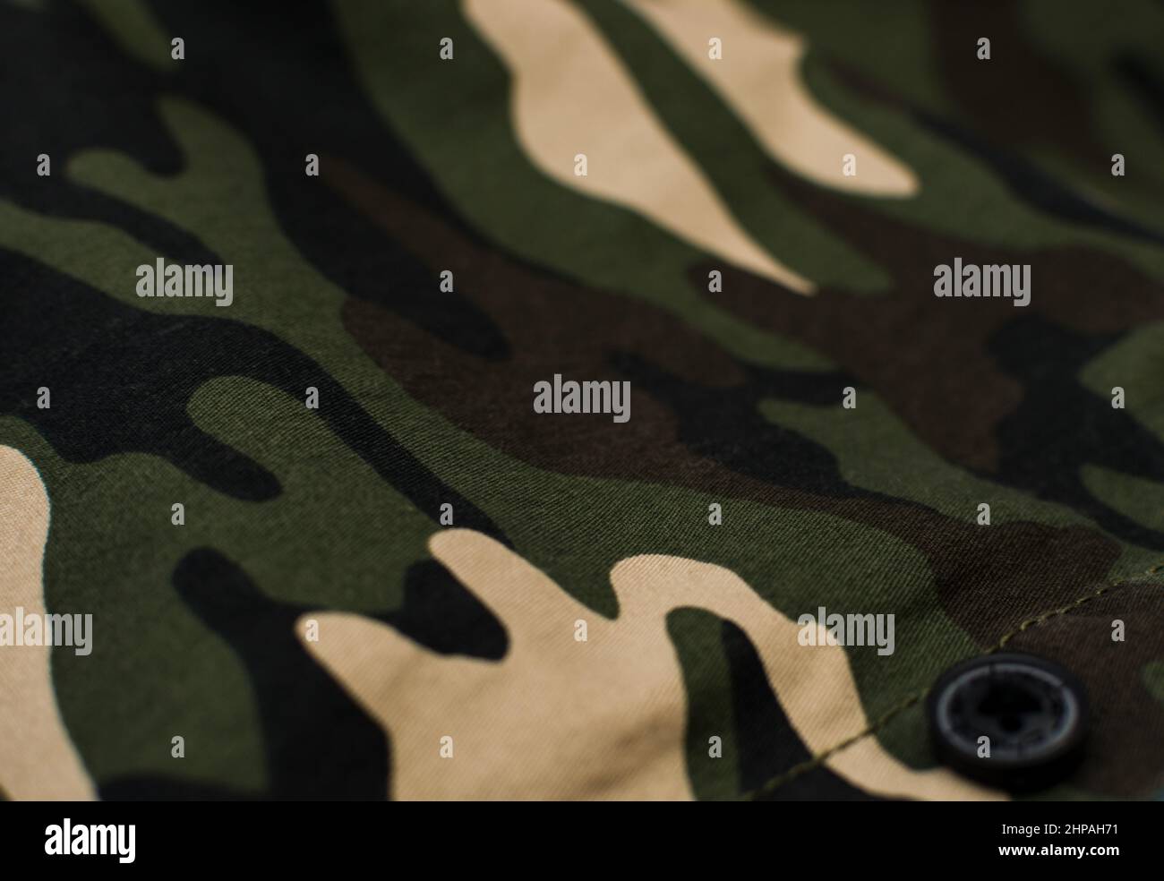 Military camouflage uniform, textile, fabric, close up Stock Photo