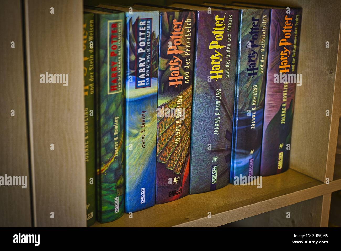 Closeup shot of the all chapters of the Harry Potter Book on the shelf