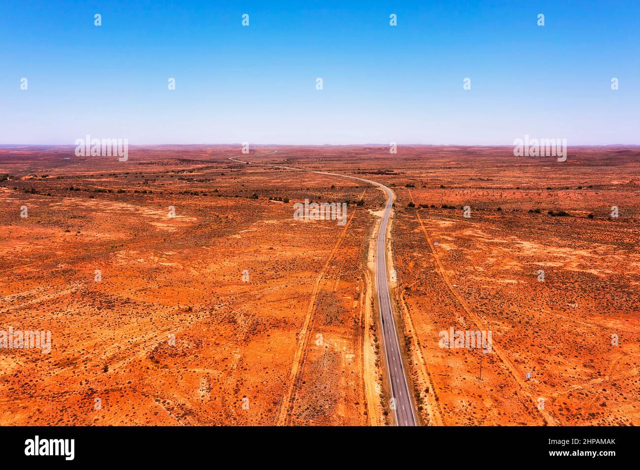Winding lonely Barrier highway in red