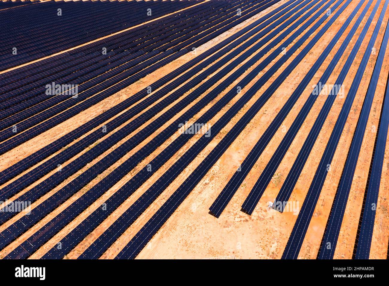 Broken hill power plant of solar panels on a electricity generation farm -  aerial top down view Stock Photo - Alamy