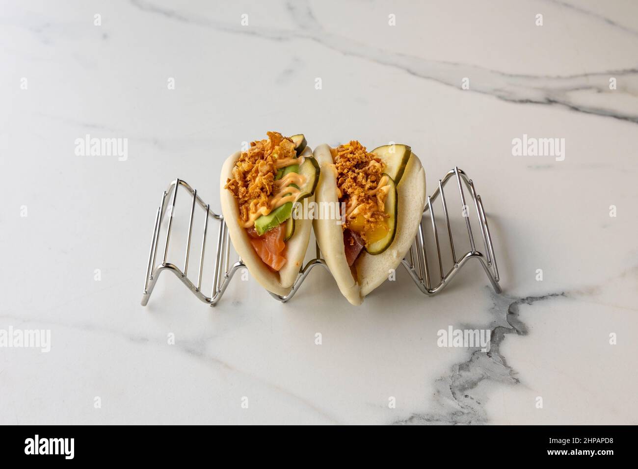 Baos on white and grey background Stock Photo