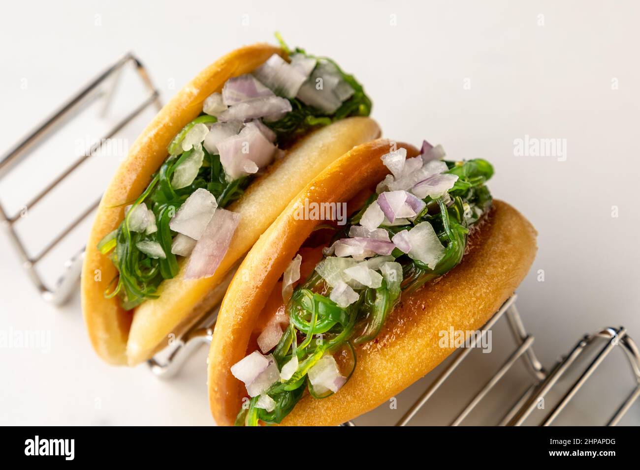 Portion of gua bao with greens and onions Stock Photo