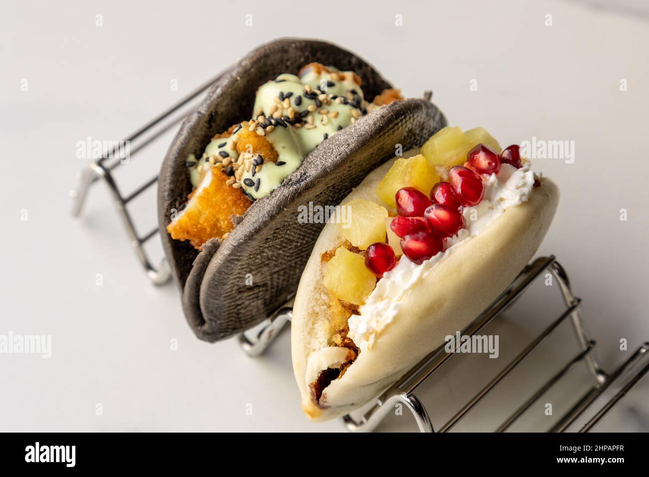 Traditional baos with condiments Stock Photo