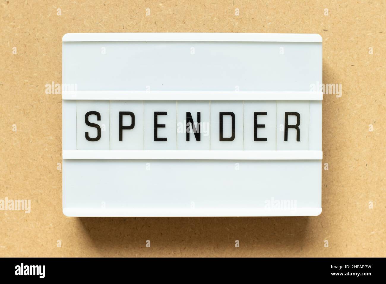 Lightbox with word spender on wood background Stock Photo