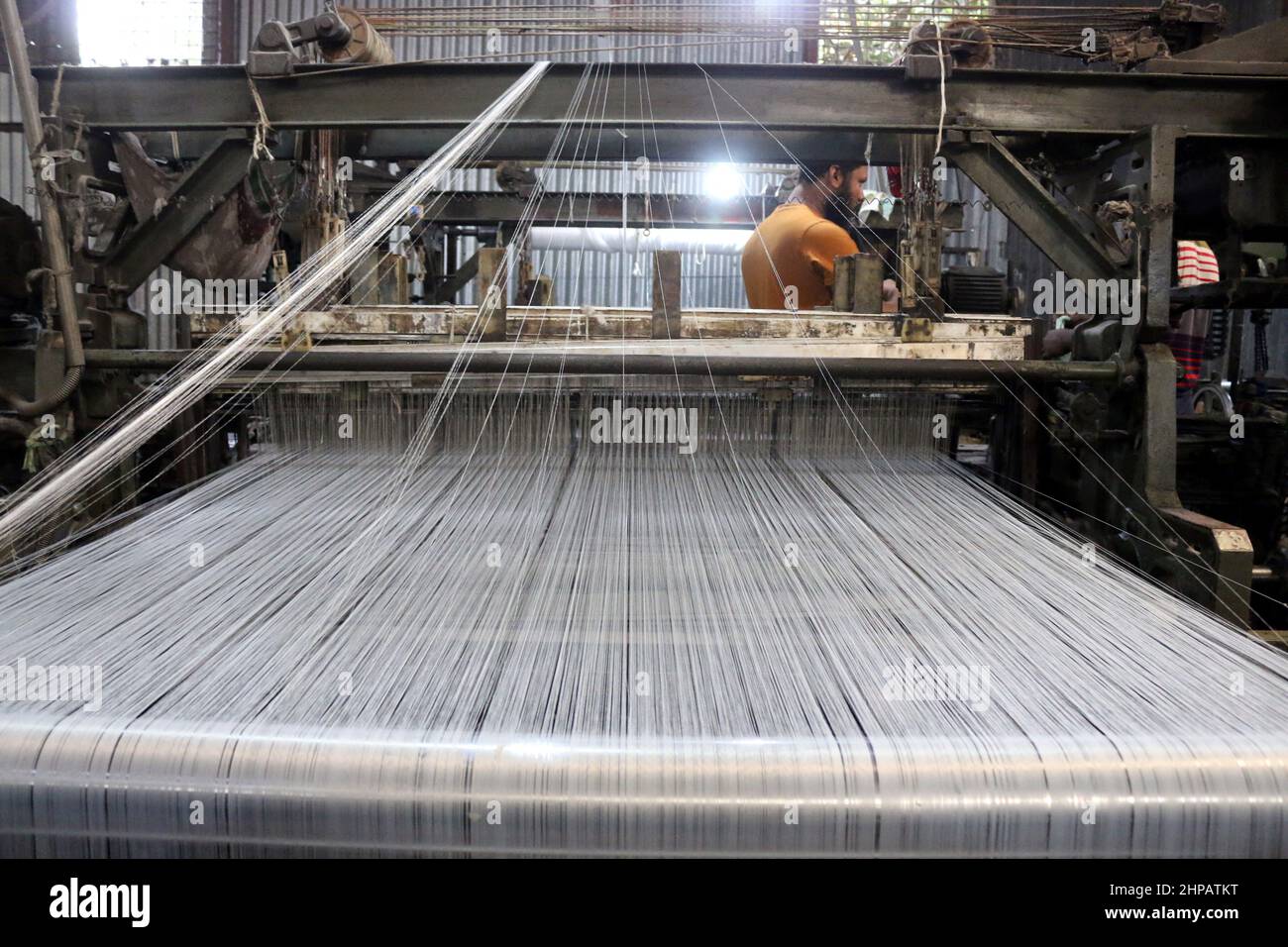 Onib Textile Workers are preparing cotton cloths in a textile mill in Rupganj As the ...