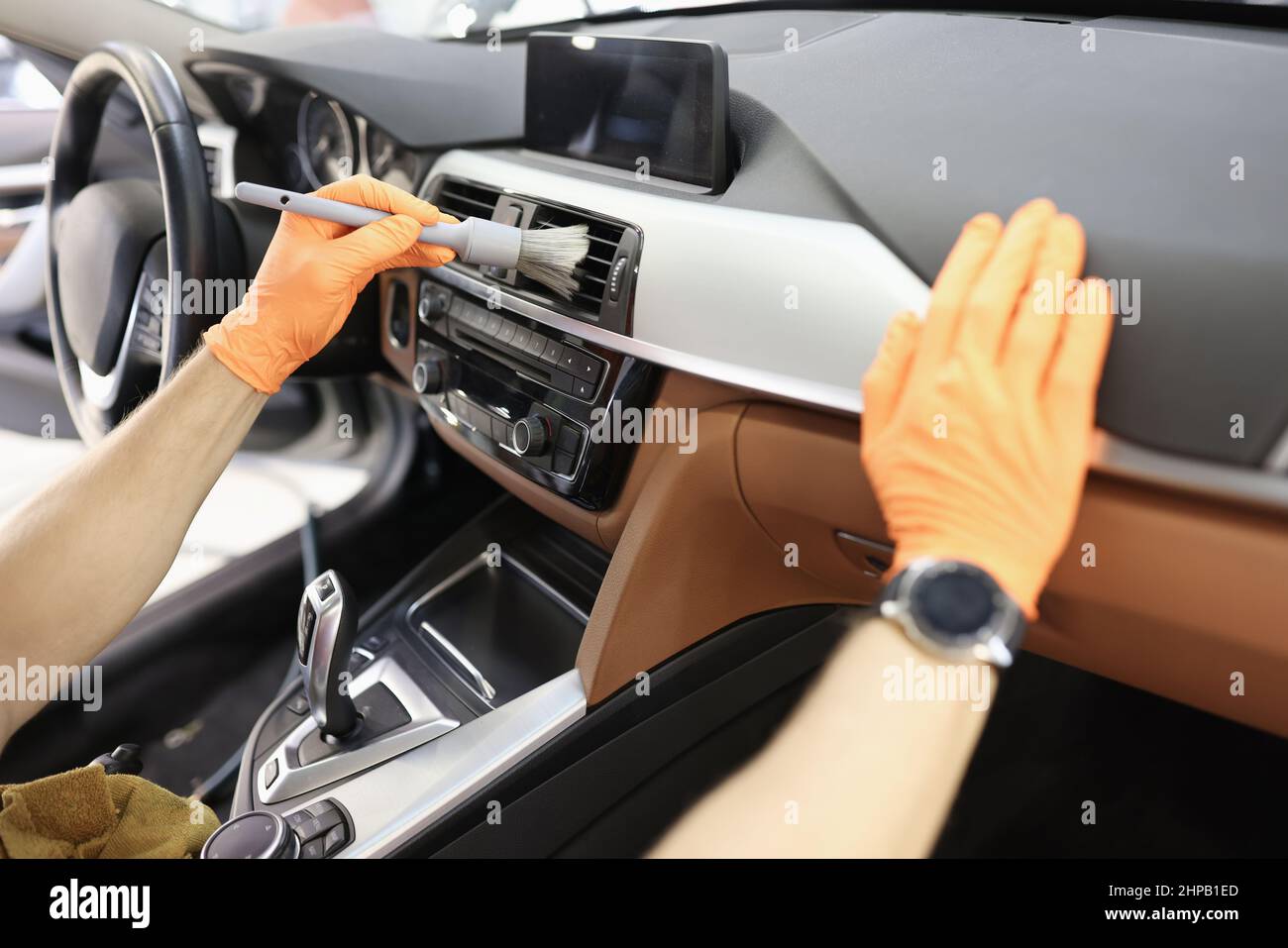 Master cleaning ventilation system in car closeup Stock Photo Alamy