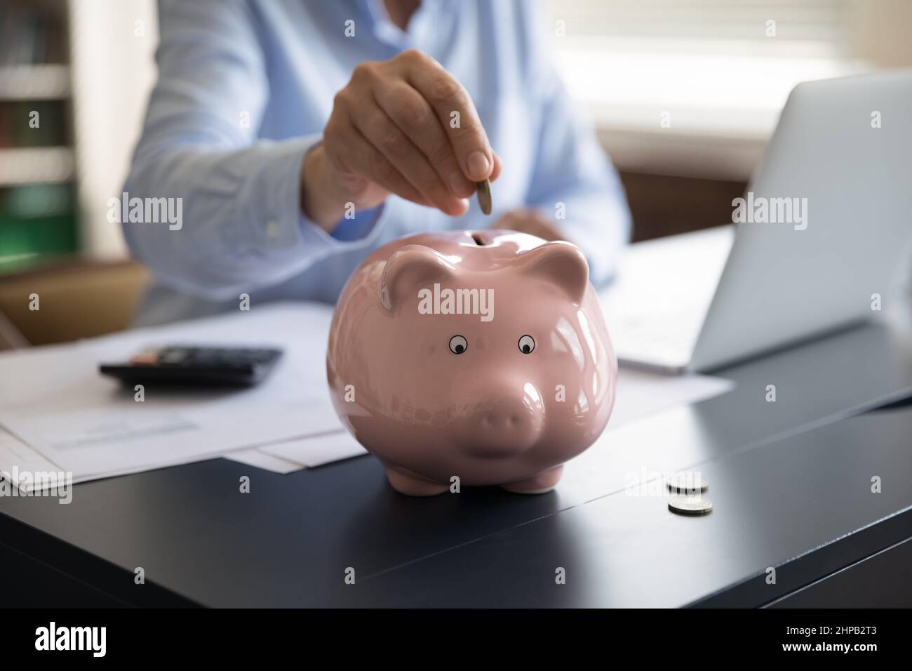 Close up cropped middle aged mature woman saving money. Stock Photo
