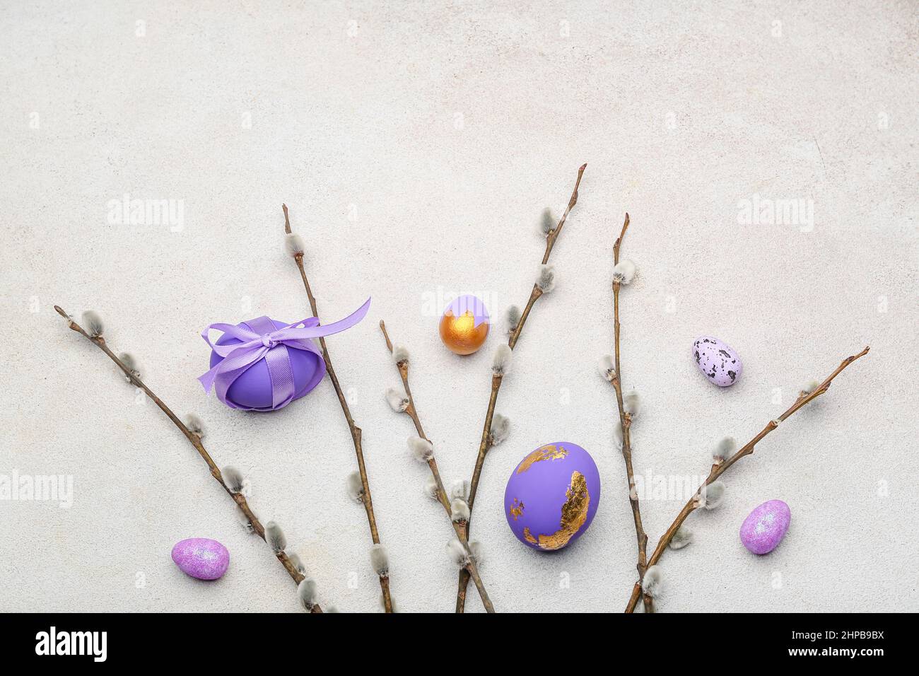Painted Easter eggs and pussy willow branches on light background Stock ...