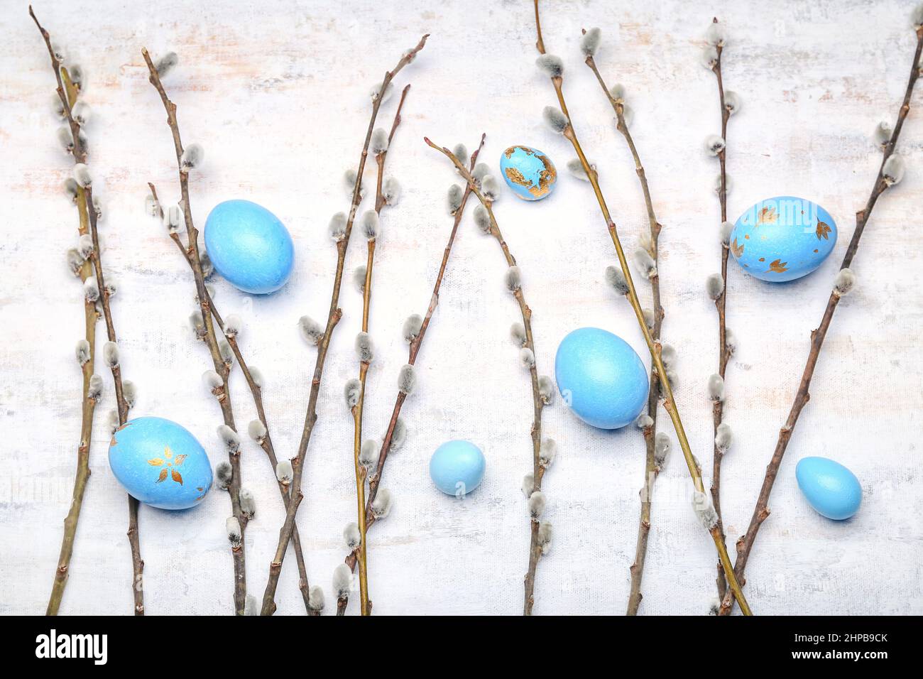 Painted Easter eggs and pussy willow branches on light background Stock ...