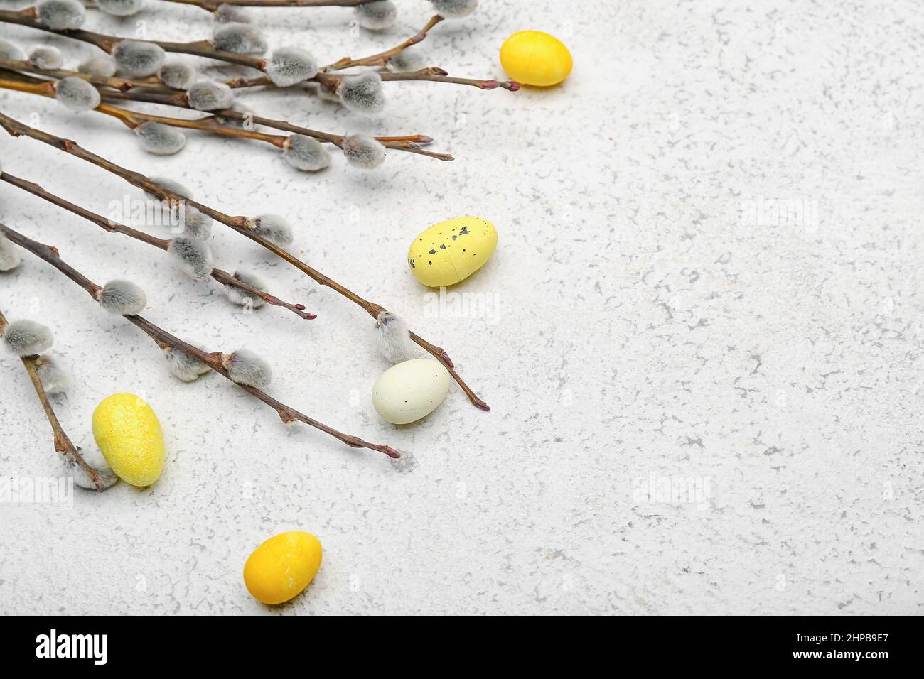 Painted Easter eggs and pussy willow branches on light background Stock ...