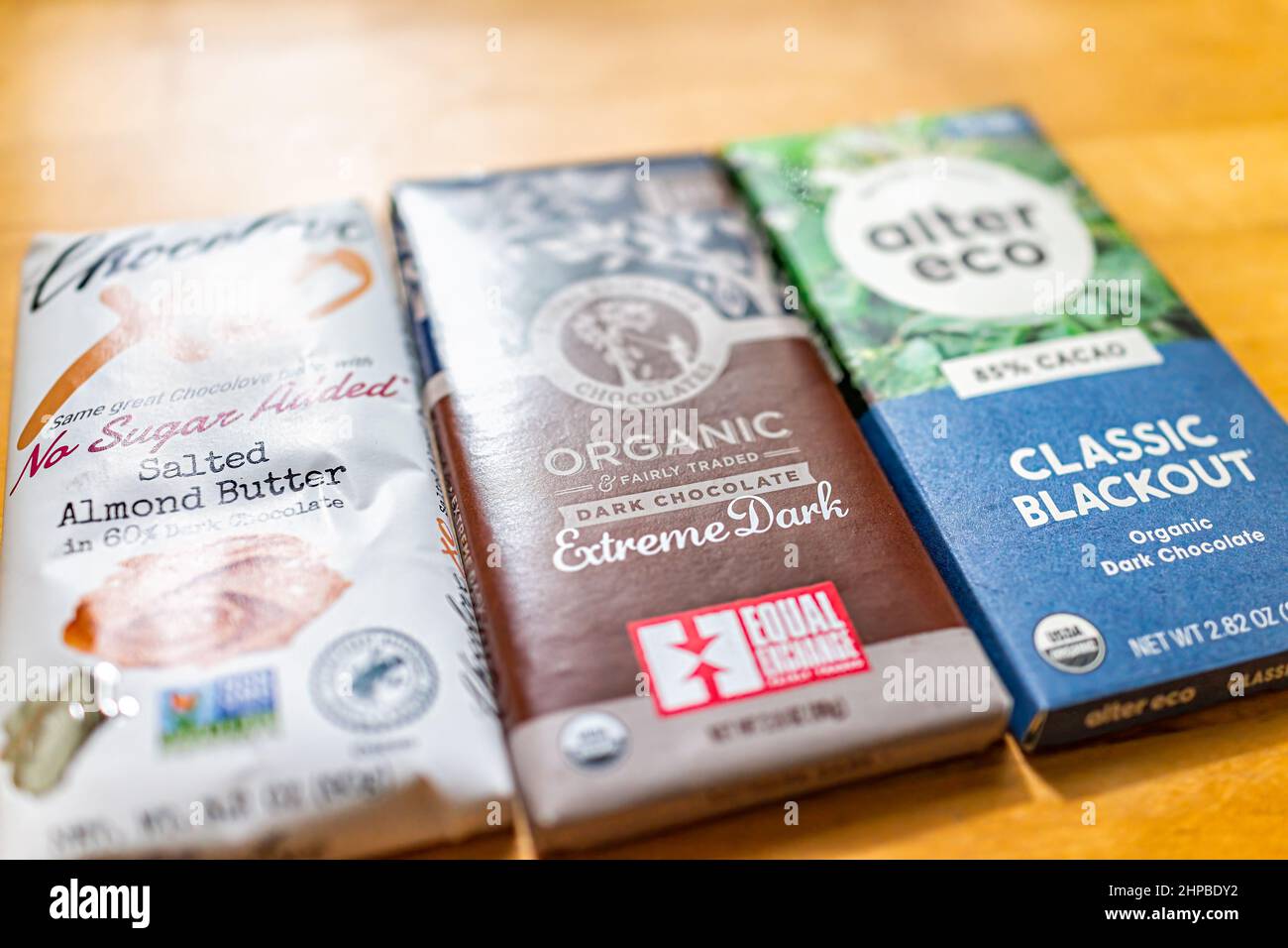 Herndon, USA October 8, 2021 Three brands of dark chocolate bars on table with Chocolove