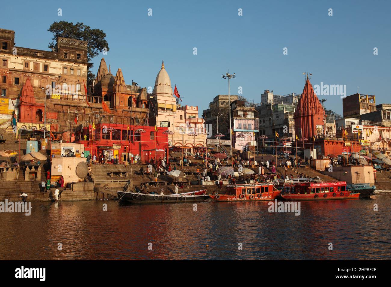 Dashashwamedh Ghat is Varanasi's holiest place on the River Ganges shot in early morning sunlight at Varanasi in Uttar Pradesh, India Stock Photo