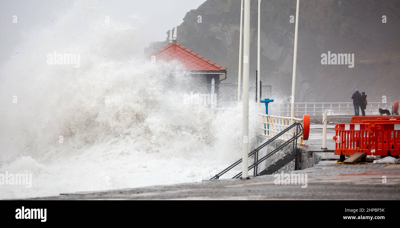 Aberystwyth, Ceredigion, Wales, UK. 20th February 2022  UK Weather: Stormy weather continues along the west coast of Aberystwyth as combining high tide, brings rough seas crashing against the promenade and sea defences. © Ian Jones/Alamy Live News Stock Photo
