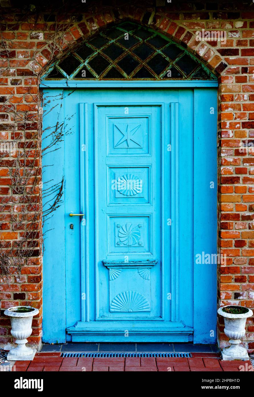 Blue house door of old brick house Stock Photo - Alamy