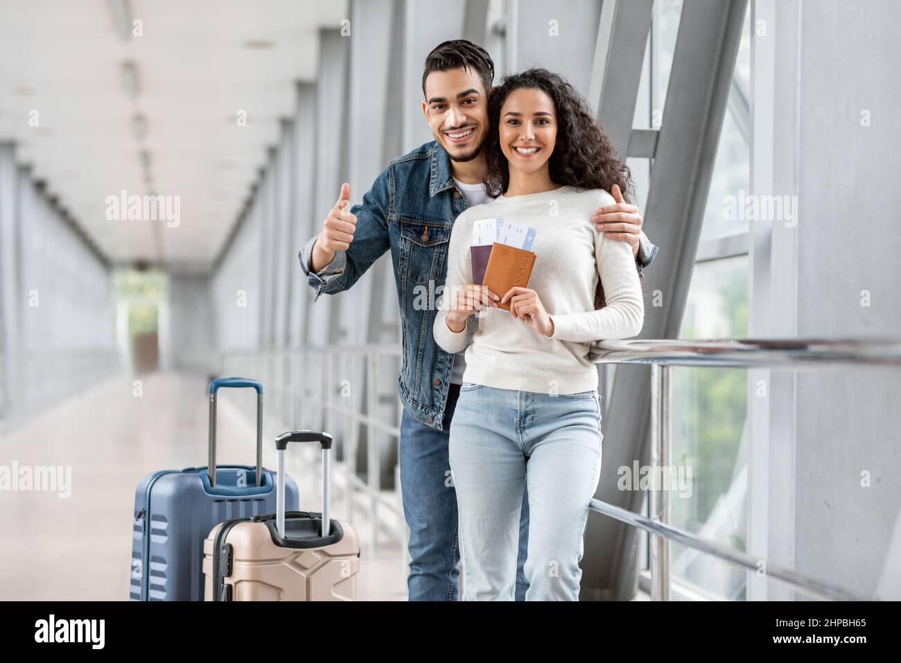 Travel Advertisement. Happy Young Arab Couple Posing At Airport ...