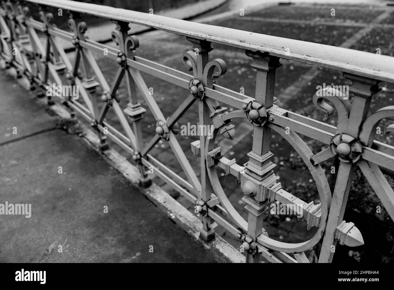 Bridge railing black and white, metal balustrade, art work Stock Photo