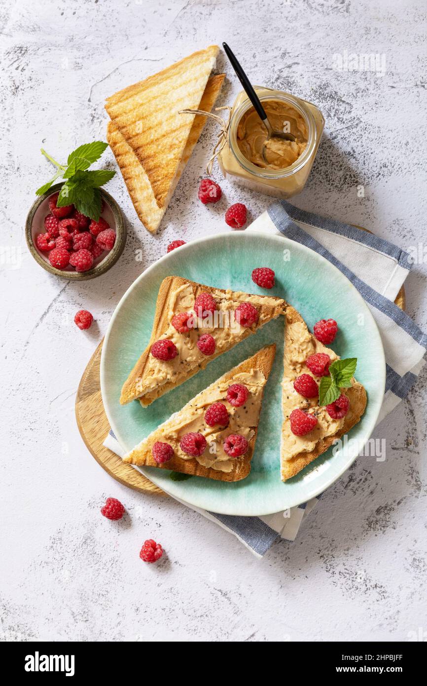 Sweet dessert sandwich breakfast. Tasty bread toasted with peanut