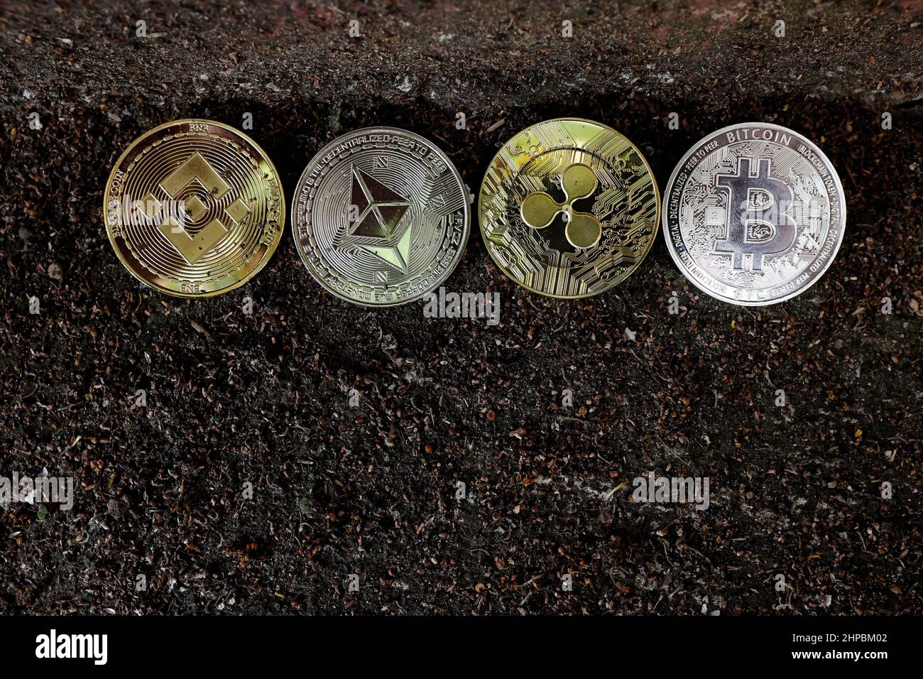 Bitcoin and crypto cryptocurrency mining, crackdown and price crash and FUD  concept. Bitcoin coins in cracked dark wall concrete Stock Photo - Alamy