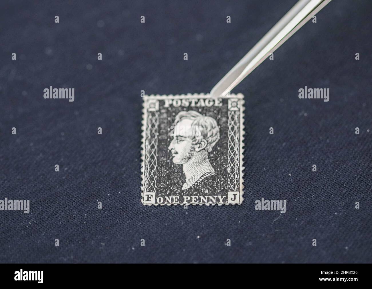 London UK 20 February 2022 Steve Allen  Dealer offering a SG DP71 (3c) 1850 Prince Consort essay printed in black and perforated 16.A fine example ,Very Scarce CAT £18.000.. Paul Quezada-Neiman/Alamy Live News Stock Photo