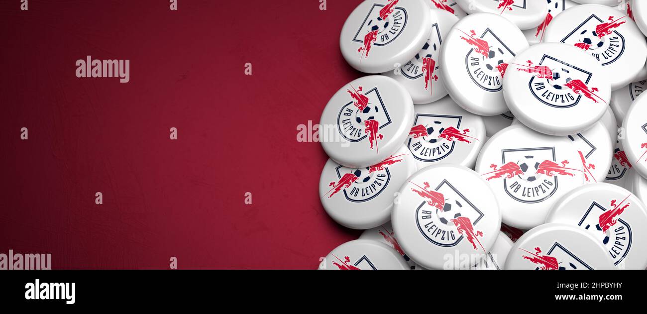 Logos of the German Soccer Club RB Leipzig on a heap on a table. Copy space. Web banner format Stock Photo