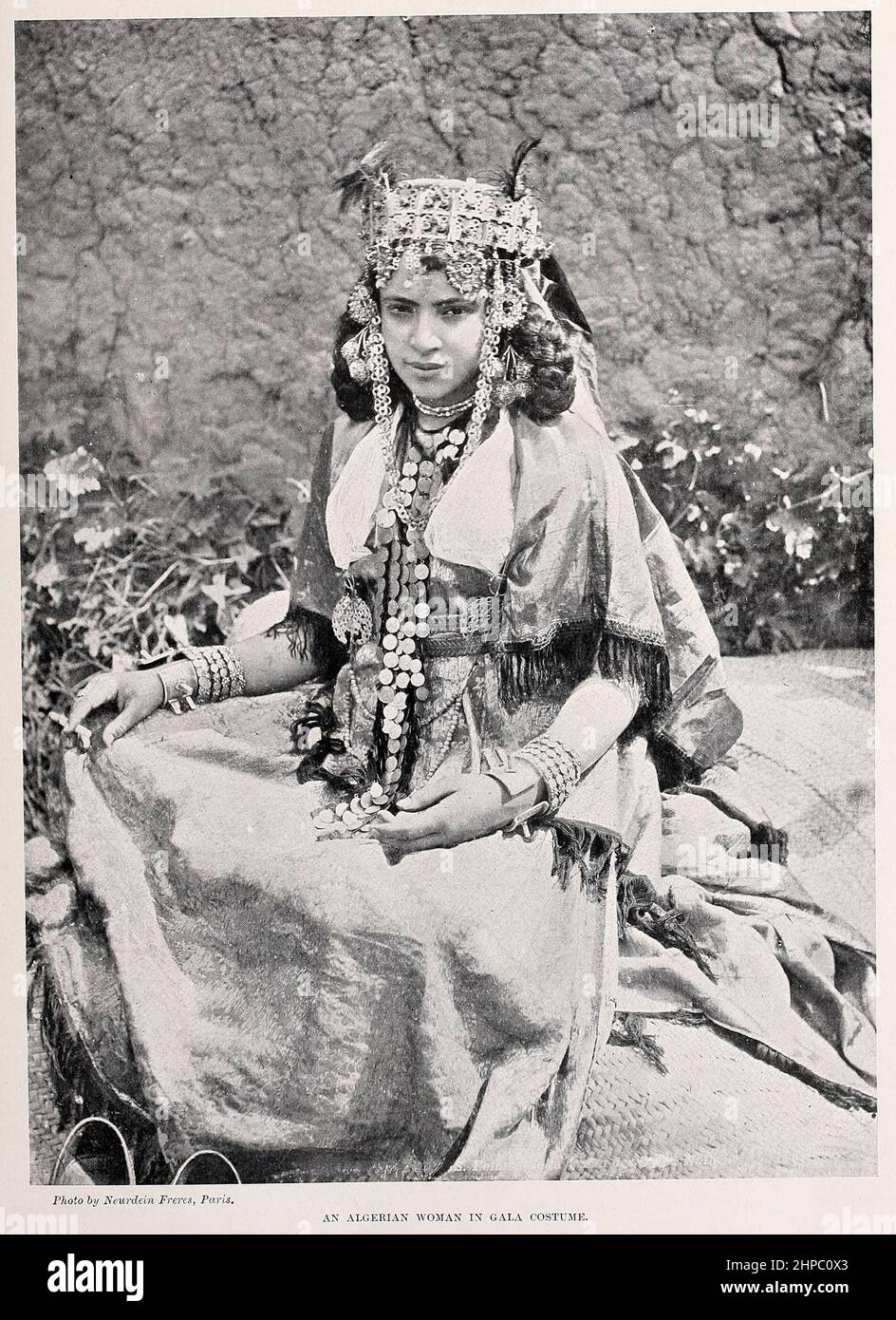 An Algerian Woman in Gala Costume from the book ' The living races of ...