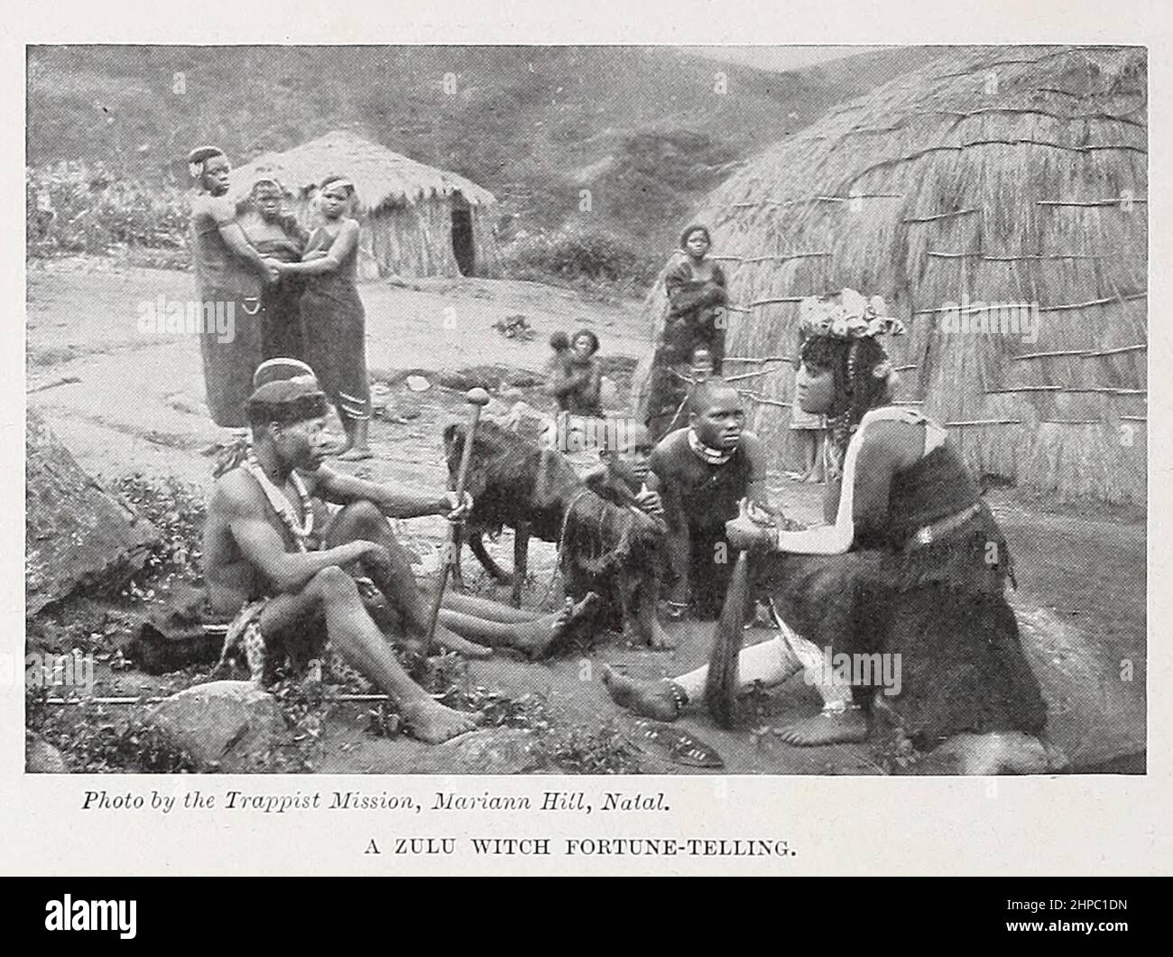 A Zulu Witch Fortune telling from the book ' The living races of mankind ' a popular illustrated account of the customs, habits, pursuits, feasts & ceremonies of the races of mankind throughout the world by Sir Harry Hamilton Johnston, and Henry Neville Hutchinson Published in London by Hutchinson & Co. in 1902 Stock Photo