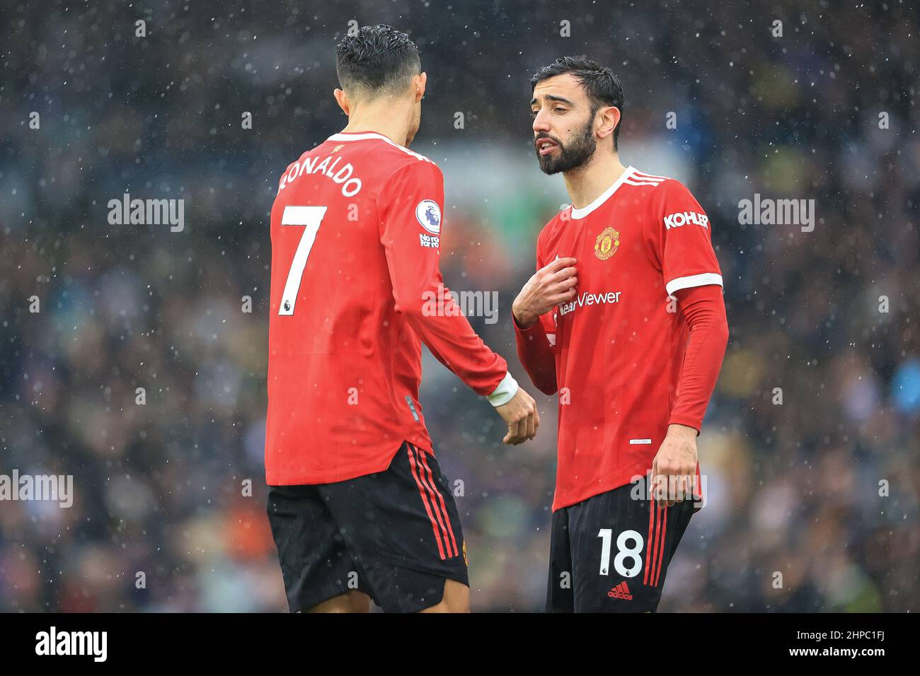 Cristiano Ronaldo #7 and Bruno Fernandes #18 of Manchester United talk during a break in play in ,  on 2/20/2022. (Photo by Mark Cosgrove/News Images/Sipa USA) Stock Photo