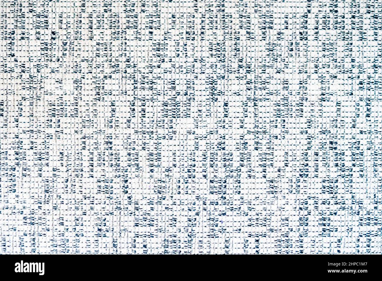 background fabric texture, machine-knitted white and black threads, modern minimalistic pattern. Stock Photo