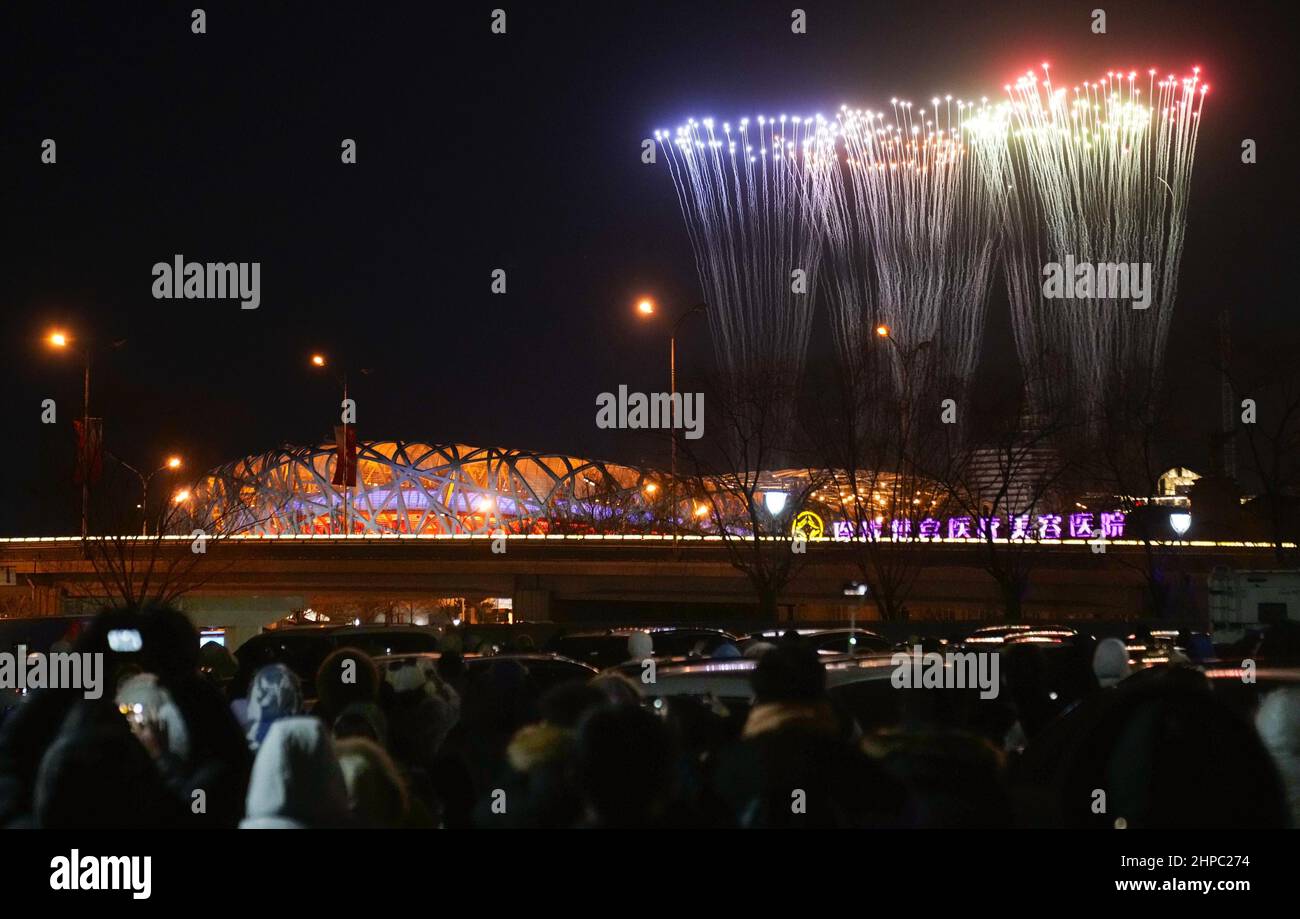 Fireworks light up the sky at the end of the closing ceremony of the Beijing Winter Olympics at