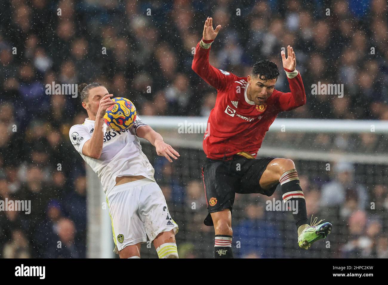 Luke Ayling #2 of Leeds United and Cristiano Ronaldo #7 of Manchester United battles for the ball in ,  on 2/20/2022. (Photo by Mark Cosgrove/News Images/Sipa USA) Stock Photo