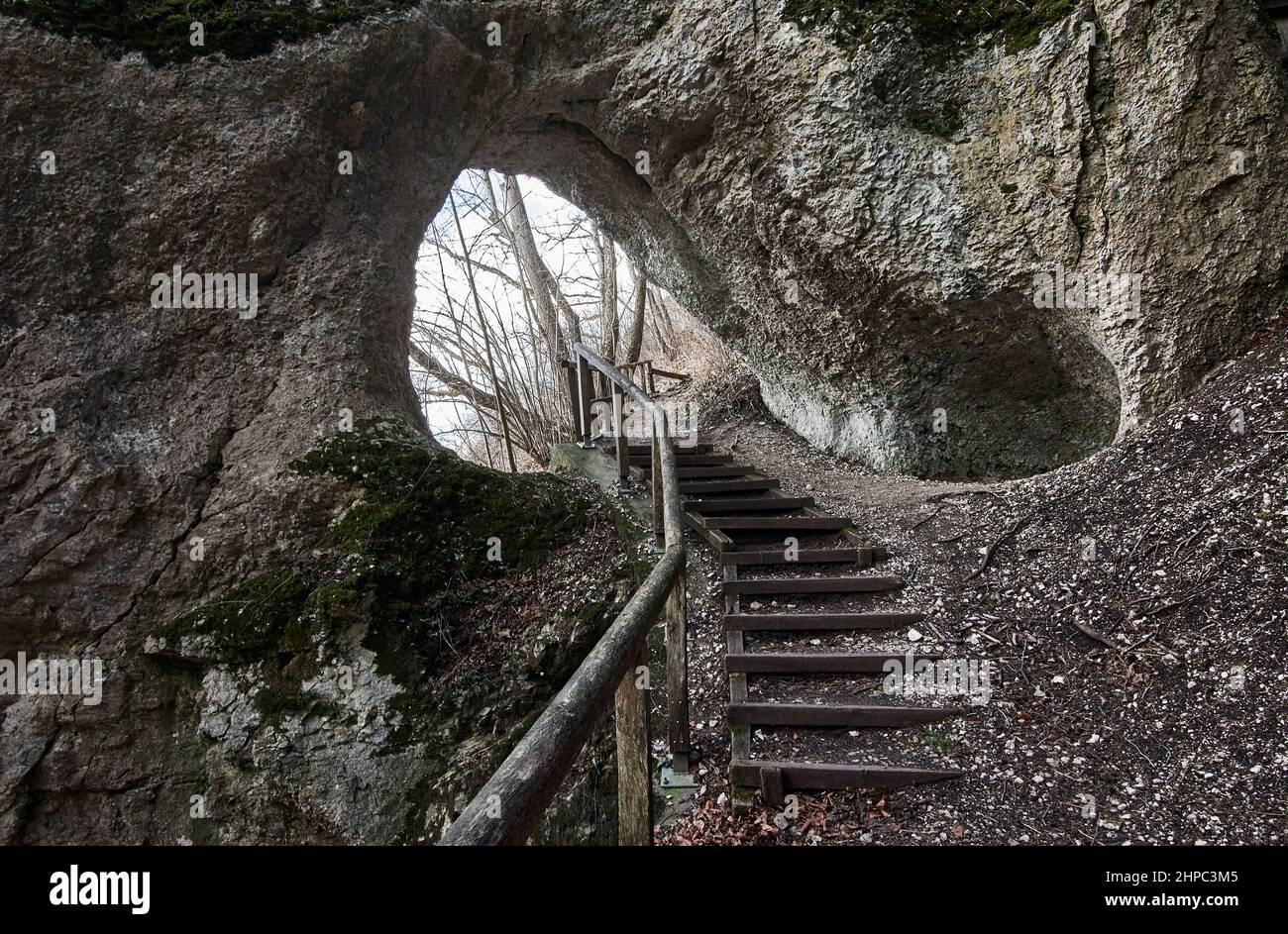 Stairway through rock tunnel at Klosterfelsenweg near Inzigkofen Princely Park, Upper Danube Nature Park, Baden-Wuerttemberg, Germany Stock Photo