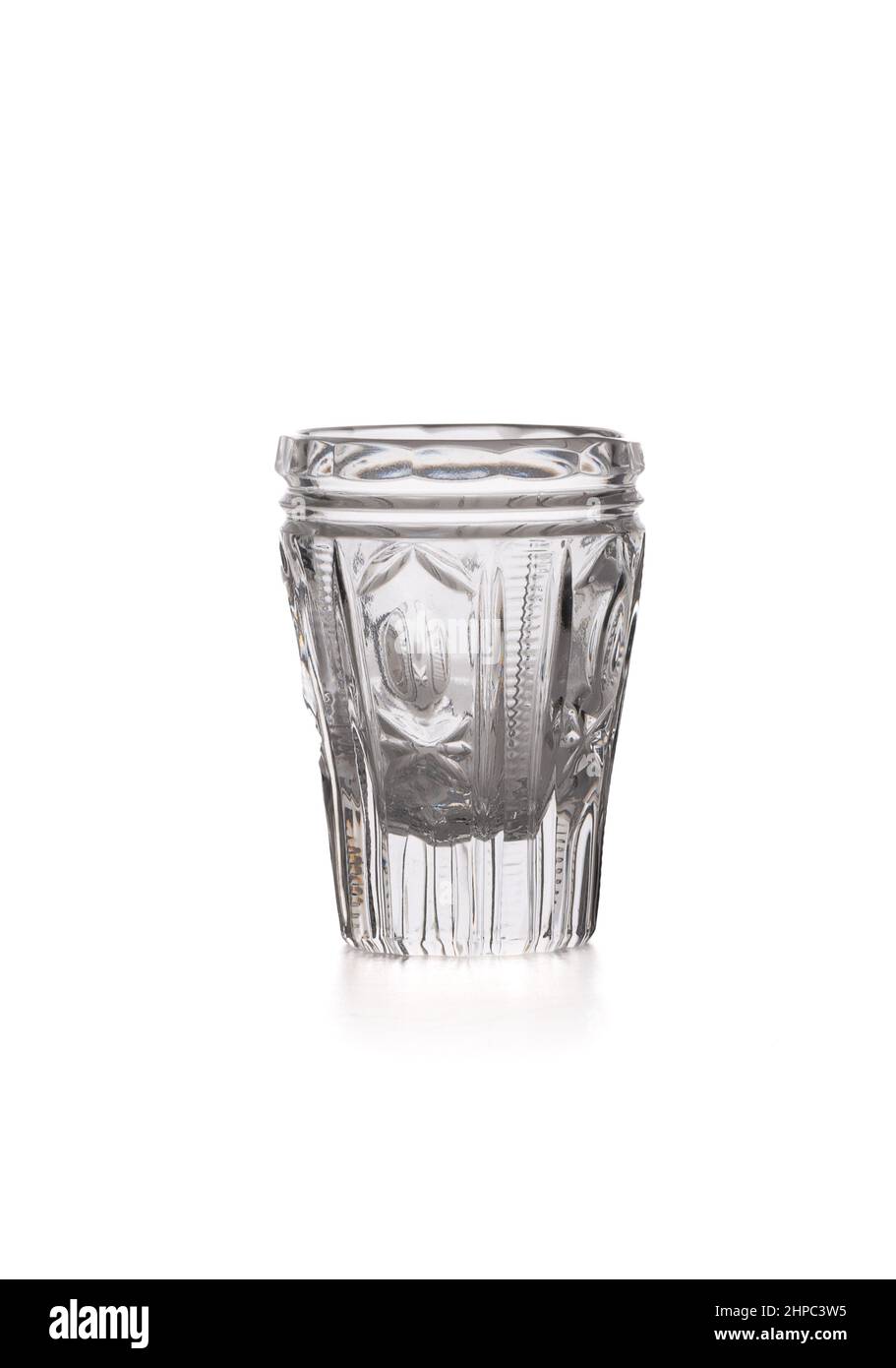 Glass shot for vodka on a white background. Copy space. Stock Photo