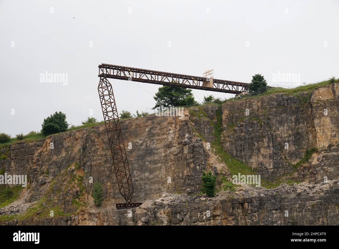 A fake railway bridge built over a disused quarry in the Peak District, UK, for a stunt involving a train crash for the film Mission Impossible 7. Stock Photo