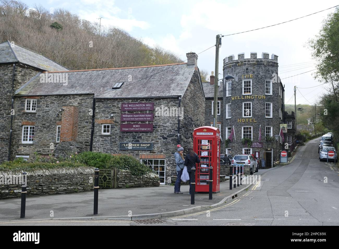 Boscastle, UK-October 2021: The Wellington Mill and The Wellington Hotel in Boscastle are prominent stone buildings in the cornish village Stock Photo