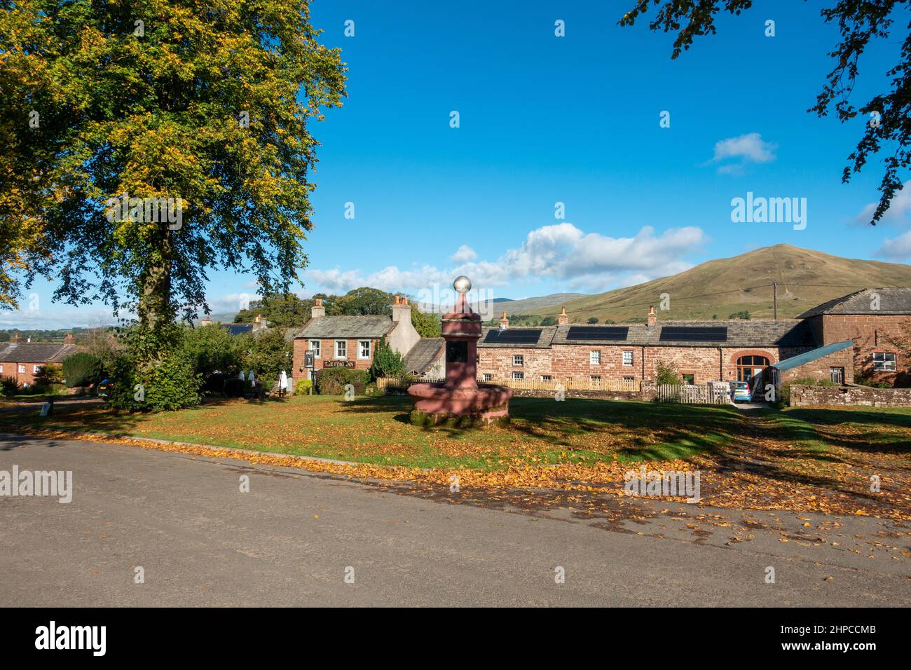 Dufton Fountain on the village green with Great Dun Fell in the